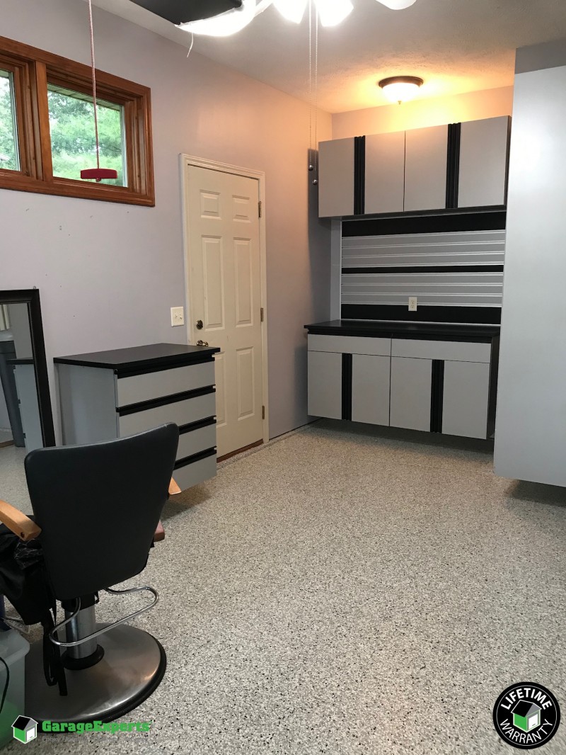Residential Garage Epoxy Flooring And Cabinet Storage Solution In