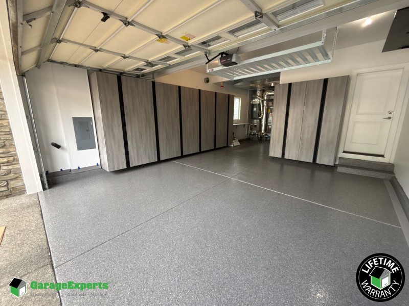 Residential Garage Epoxy Flooring and Cabinet Storage Solution in Mill Creek, Wa Image