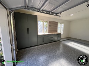 Residential Garage Epoxy Flooring and Cabinet Storage Solution in Benbrook, Texas