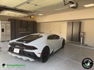 Residential Garage Epoxy Flooring and Cabinet Storage Solution in Tucson, Az