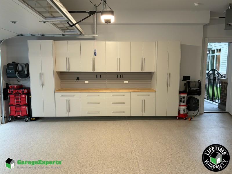 Residential Garage Epoxy Flooring and Cabinet Storage Solution in Naperville, Il