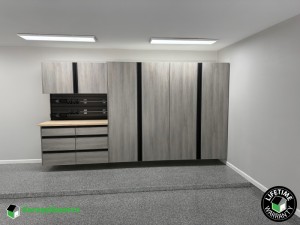 Residential Garage Epoxy Flooring and Cabinet Storage Solution in Baton Rouge, La