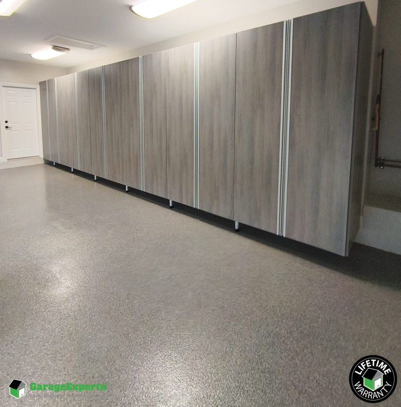 Residential Garage Epoxy Flooring and Cabinet Storage Solution in Plantation, Fl Image