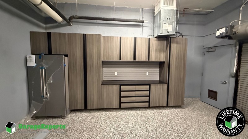 Residential Garage Epoxy Flooring and Cabinet Storage Solution in Miami, Fl