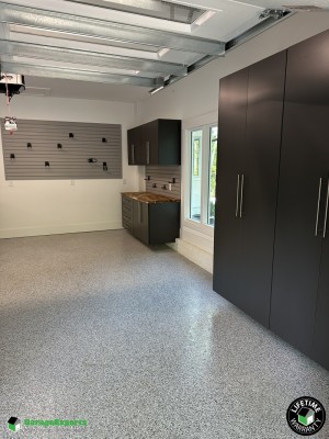 Residential Garage Epoxy Flooring and Cabinet Storage Solution in Cary, Nc