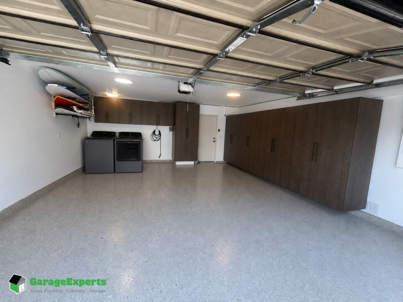 Residential Garage Epoxy Flooring and Cabinet Storage Solution in Costa Mesa, California