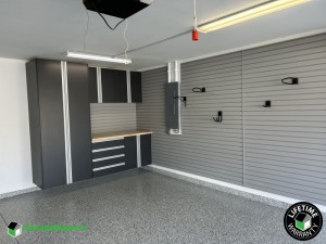 Residential Garage Epoxy Flooring and Cabinet Storage Solution in Lakeland, Fl