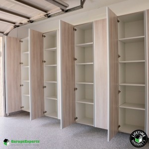 Residential Garage Epoxy Flooring and Cabinet Storage Solution in Lakeland, Fl