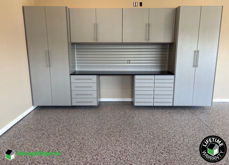 Residential Garage Epoxy Flooring and Cabinet Storage Solution in Ozark, Mo
