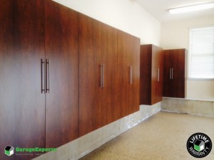 Residential Garage Epoxy Flooring and Cabinet Storage Solution in Davidson, Nc