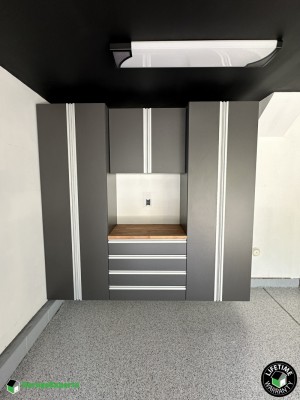 Residential Garage Epoxy Flooring and Cabinet Storage Solution in Fuquay Varina, Nc