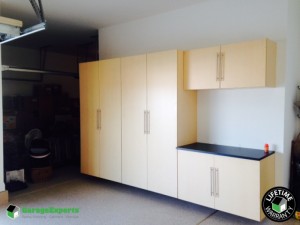 Residential Garage Epoxy Flooring and Cabinet Storage Solution in Mint Hill, Nc