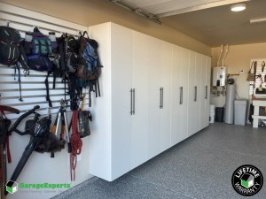 Residential Garage Epoxy Flooring and Cabinet Storage Solution in Oro Valley, Az