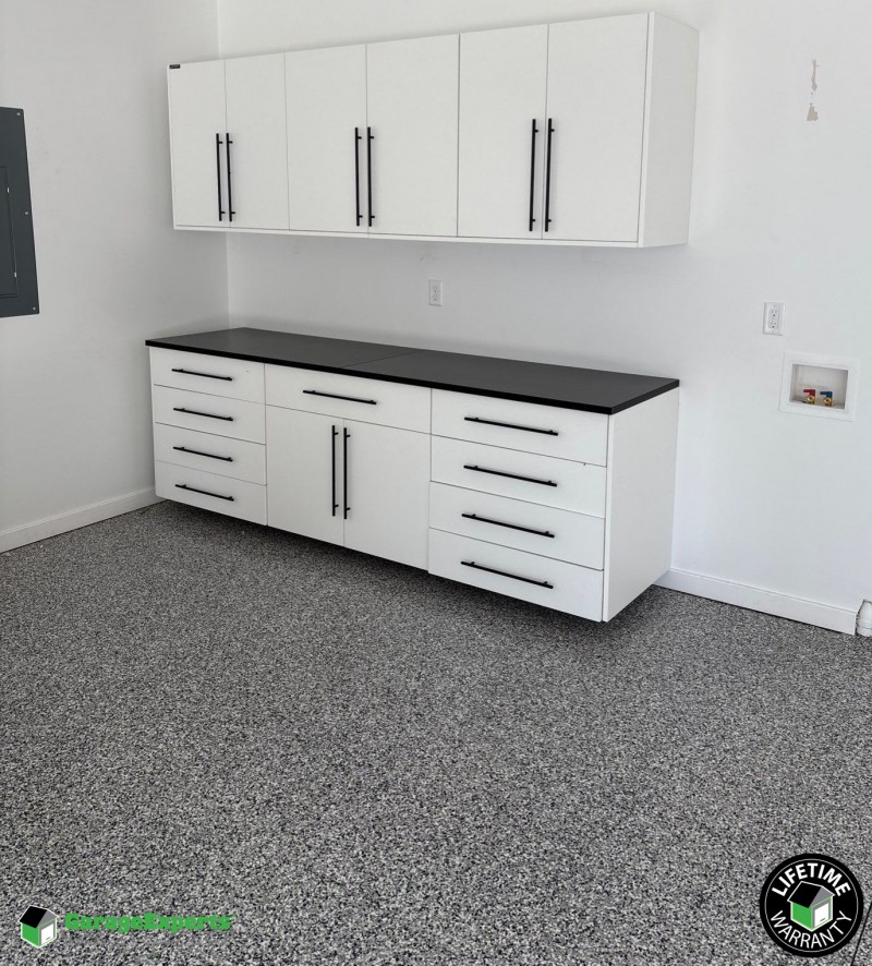 Residential Garage Epoxy Flooring and Cabinet Storage Solution in Springfield, Mo