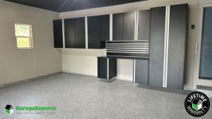 Residential Garage Epoxy Flooring and Cabinet Storage Solution in Lakeville, Mn