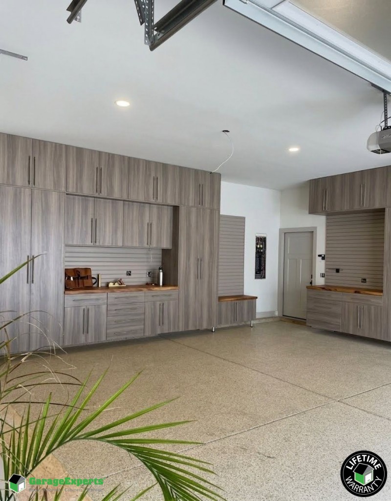 Residential Garage Epoxy Flooring and Cabinet Storage Solution in New Hope, Al