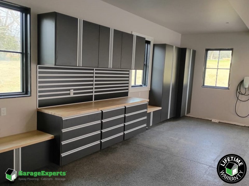 Residential Garage Epoxy Flooring and Cabinet Storage Solution in Elburn, Il Image