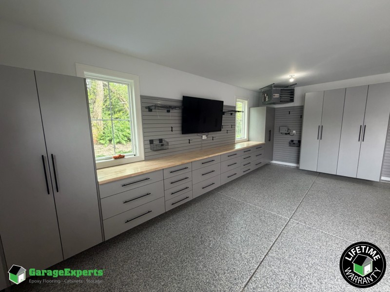 Residential Garage Epoxy Flooring and Cabinet Storage Solution in Lisle, Il Image