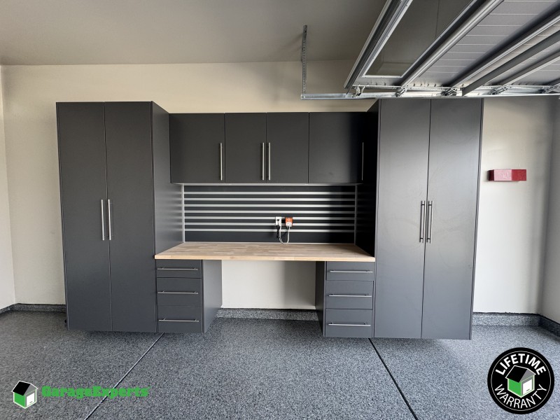 Residential Garage Epoxy Flooring and Cabinet Storage Solution in Clovis, Ca Image