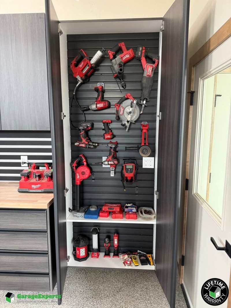 Residential Garage Epoxy Flooring and Cabinet Storage Solution in Yorkville, Illi Image