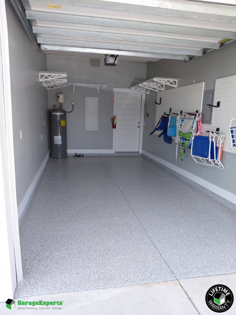 Residential Garage Epoxy Flooring and Storage Solution in Panama City Beach, Florida
