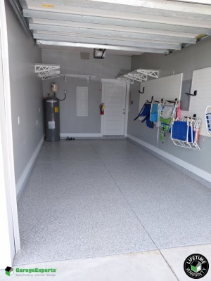 Residential Garage Epoxy Flooring and Storage Solution in Panama City Beach, Florida