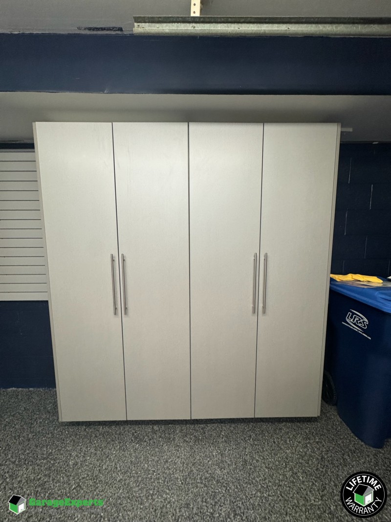 Residential Garage Epoxy Flooring and Cabinet Storage Solution in Lombard, Il