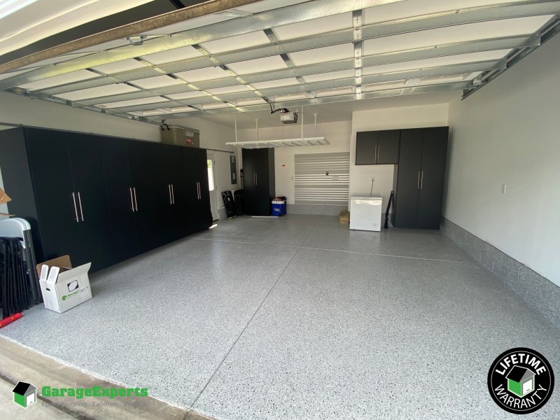Residential Garage Epoxy Flooring and Cabinet Storage Solution in Suffolk, Va
