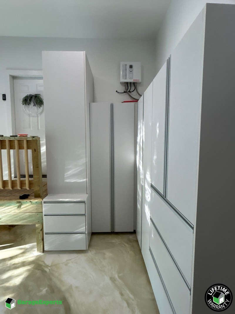 Residential Garage Epoxy Flooring and Cabinet Storage Solution in Mount Pleasant, Sc Image