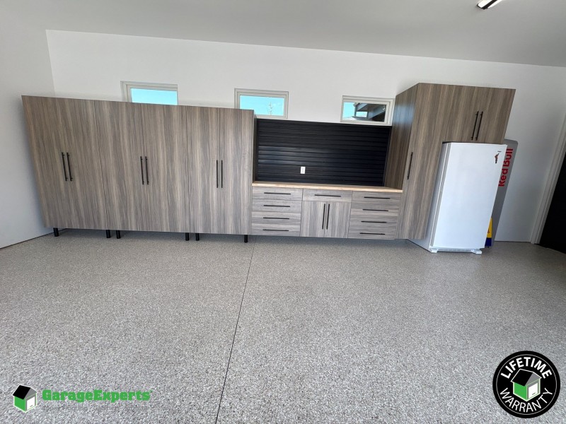 Residential Garage Epoxy Flooring and Cabinet Storage Solution in Maize, Ks