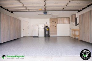 Residential Garage Epoxy Flooring and Cabinet Storage Solution in Lakeland, Fl