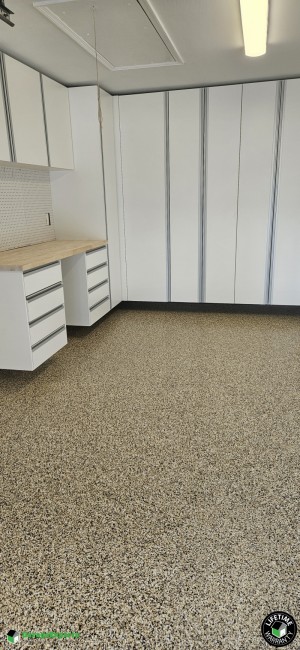 Residential Garage Epoxy Flooring and Cabinet Storage Solution in Lakeland, Fl