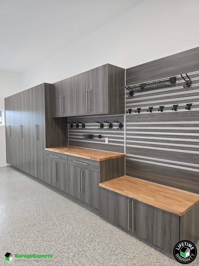 Residential Garage Epoxy Flooring and Cabinet Storage Solution in Huntsville, Al