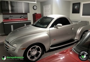 Residential Garage Epoxy Flooring and Cabinet Storage Solution in Algiers, La