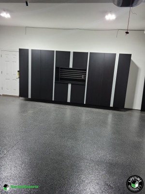 Residential Garage Epoxy Flooring and Cabinet Storage Solution in Glastonbury, Ct