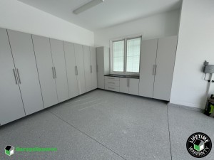 Residential Garage Epoxy Flooring and Cabinet Storage Solution in Lexington, Ky