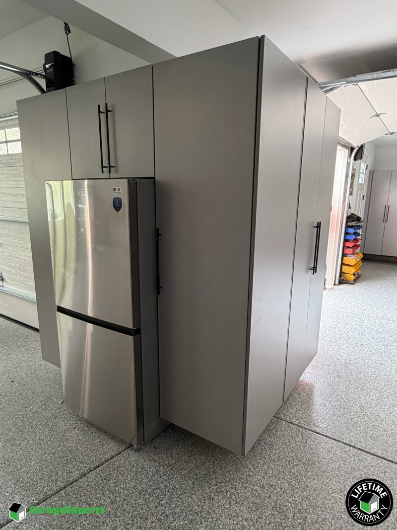 Residential Garage Epoxy Flooring and Cabinet Storage Solution in Hinsdale, Il Image
