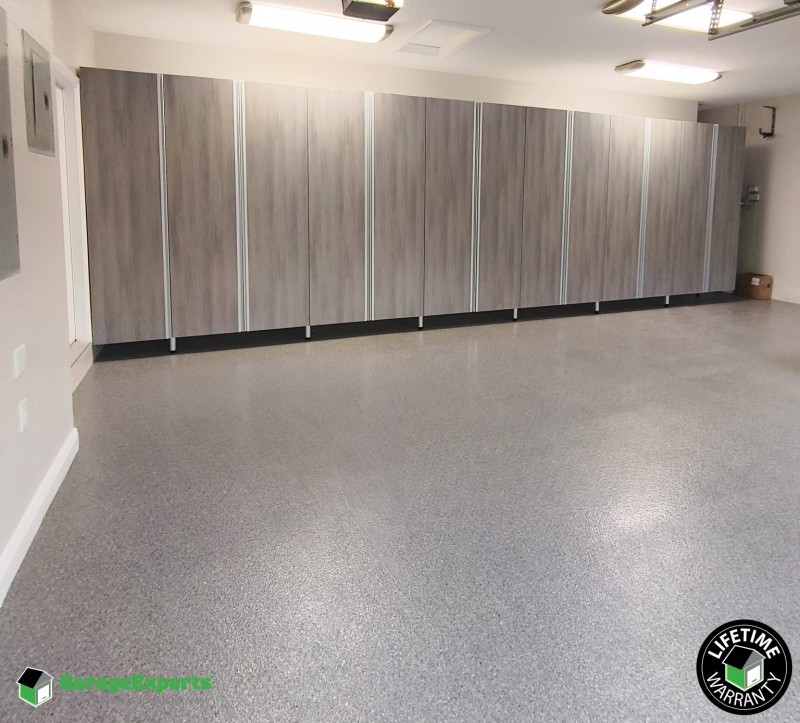 Residential Garage Epoxy Flooring and Cabinet Storage Solution in Plantation, Fl Image