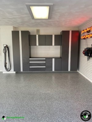 Residential Garage Epoxy Flooring and Cabinet Storage Solution in Edwardsville, Il