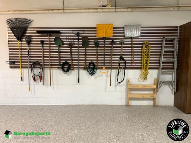 Residential Garage Epoxy Flooring and Cabinet Storage Solution in Oak Ridge, Nc Image