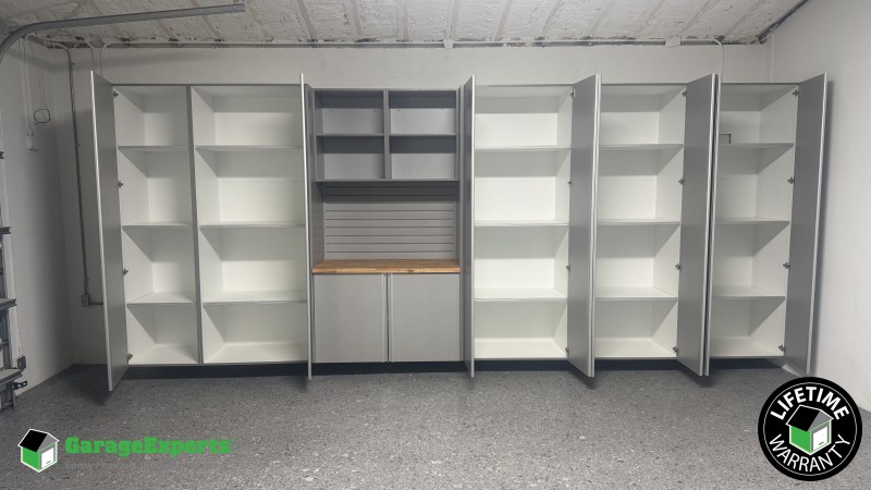 Residential Garage Epoxy Flooring and Cabinet Storage Solution in Miami, Fl