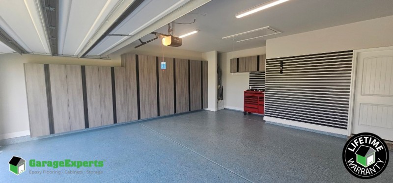 Residential Garage Epoxy Flooring and Cabinet Storage Solution in Freeport, Florida