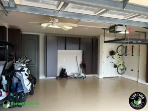 Residential Garage Epoxy Flooring and Cabinet Storage Solution in Lakeland, Fl