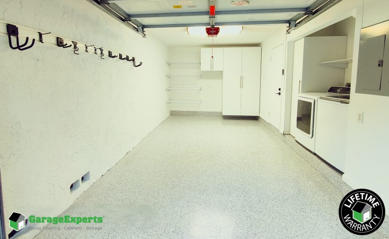 Residential Garage Epoxy Flooring and Cabinet Storage Solution in Davie, Fl Image