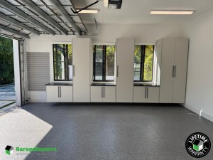 Residential Garage Epoxy Flooring and Cabinet Storage Solution in Maimi, Fl