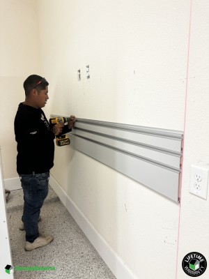 Residential Garage Epoxy Flooring and Cabinet Storage Solution in Missouri City, Texas