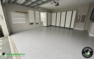Residential Garage Makeover With Paint Epoxy Flooring and Cabinet Storage Solution in Palm City, Fl