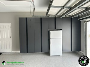 Residential Garage Epoxy Flooring and Cabinet Storage Solution in Lakeland, Fl