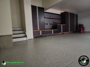 Residential Garage Epoxy Flooring and Cabinet Storage Solution in Solon, Ohio