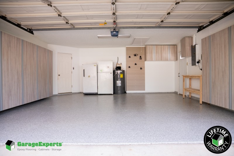 Residential Garage Epoxy Flooring and Cabinet Storage Solution in Lakeland, Fl